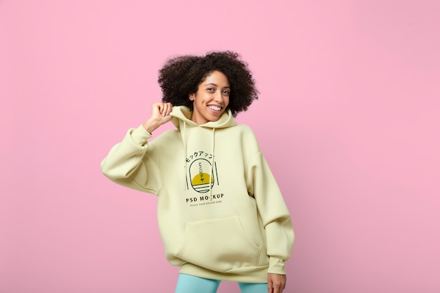 Beautiful woman wearing hoodie mockup