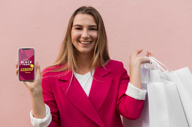 Beautiful woman with black friday bag concept