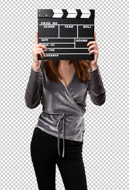 PSD beautiful young girl holding a clapperboard