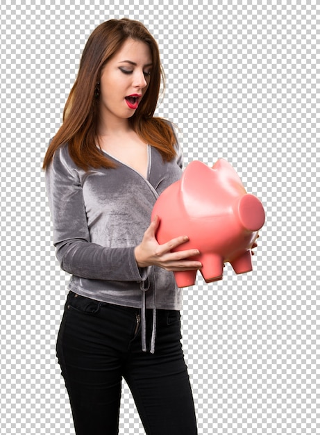 PSD beautiful young girl holding a piggybank