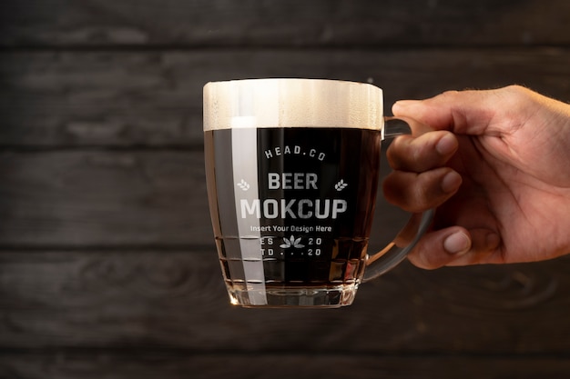 PSD beer mug mockup on wooden table