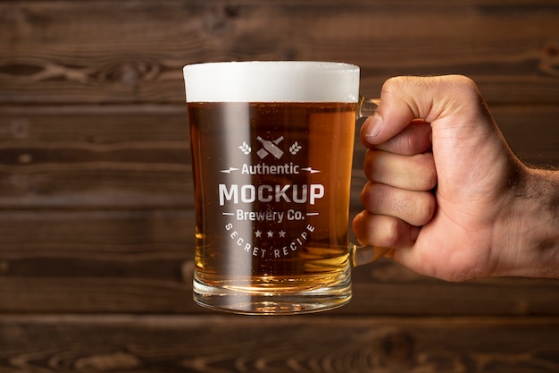 Beer mug mockup on wooden table