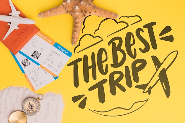 The best trip, lettering with starfish, airplane ticket and compass