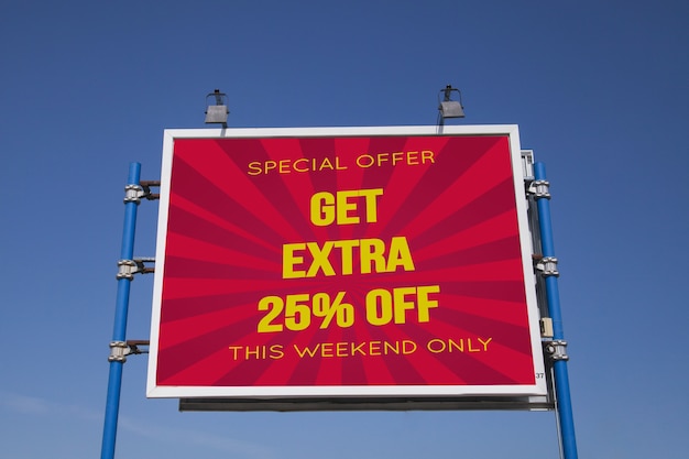 Billboard mockup against blue sky background