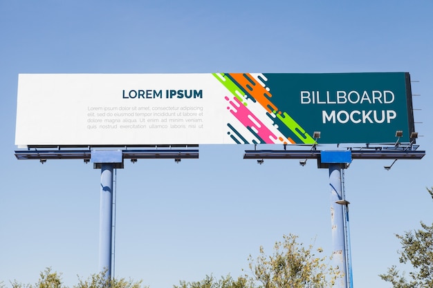 PSD billboard mockup on blue sky background