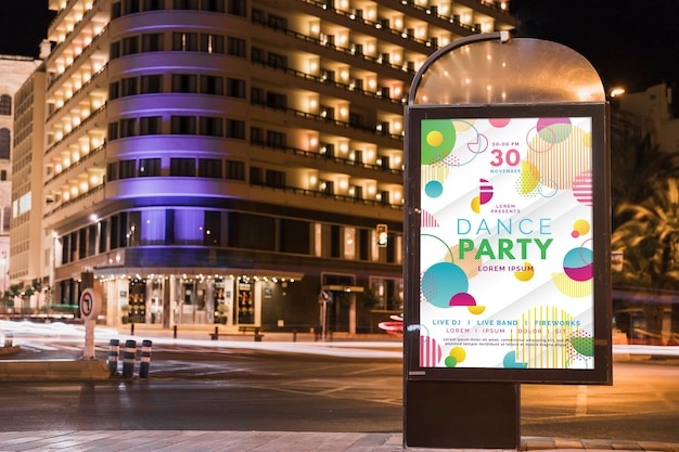 PSD billboard mockup in city at night