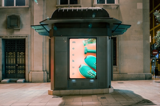 PSD billboard mockup in city at night