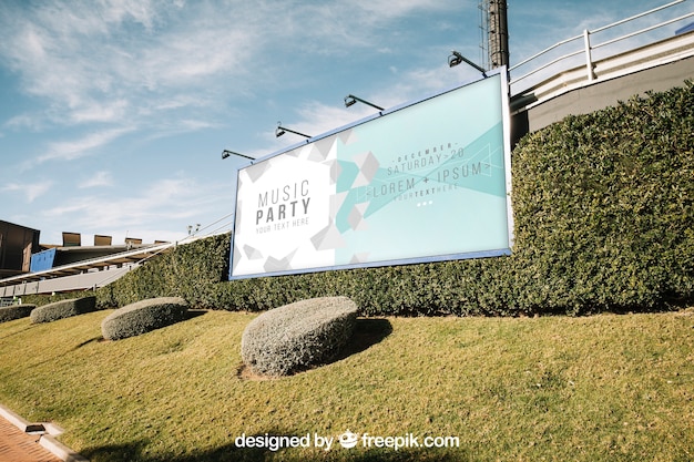 Billboard mockup in green urban environment