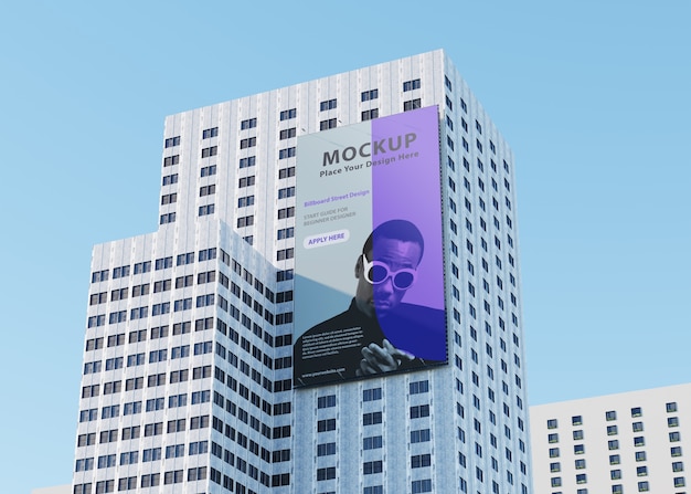 PSD billboard mockup on tall building on the street