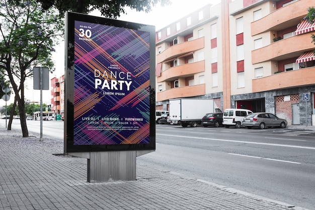 PSD billboard mockup in urban landscape