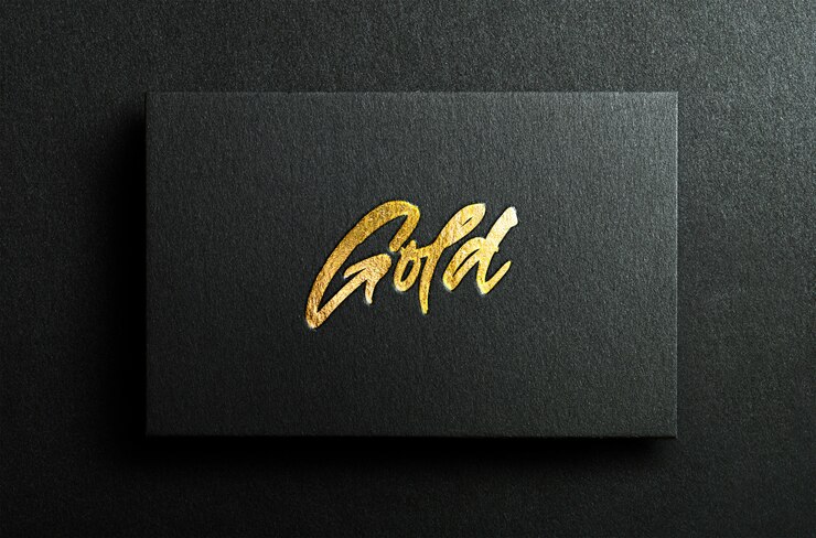 Black business card with golden foil lettering