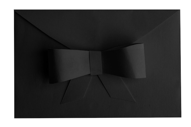Black envelope with a bow on a blank background