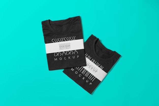 Black folded t shirt with paper belt mockup