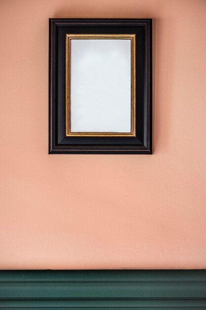 PSD black frame against a peach wall