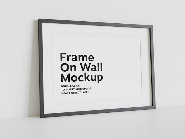 black frame leaning on wall mockup