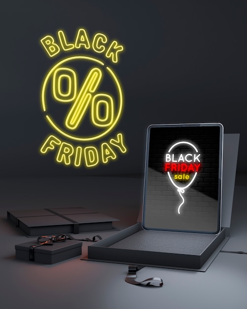 Black friday background with tablet and yellow neon lights