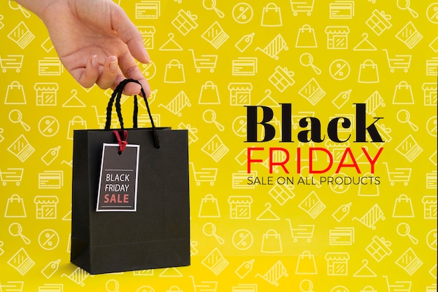 Black friday concept on yellow background
