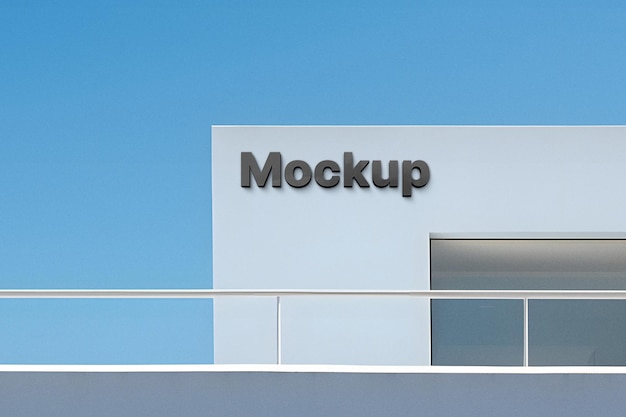 Mockup del logo nero 3d segno moderno edificio bianco psd 3