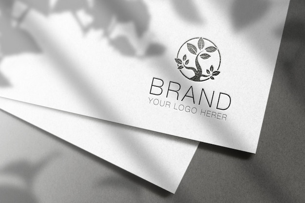 Black logo on a white paper mockup