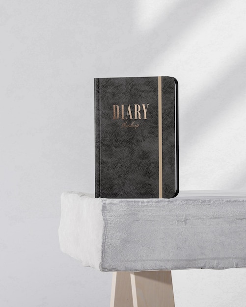 Black luxury leather diary logo product mockup on white concrete background 3d render