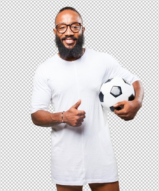 Black man holding a soccer ball