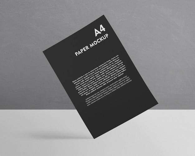 A black paper mockup with the word paper on it