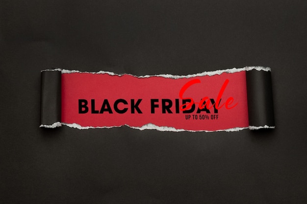 PSD black torn paper and the text black friday sale mockup for your design