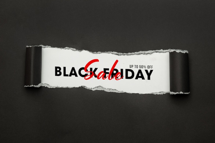 PSD black torn paper and the text black friday sale mockup