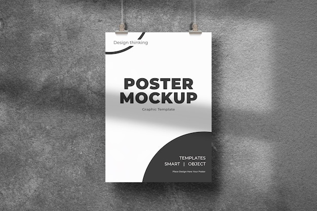 Black and white poster mockup hanging on grunge wall texture