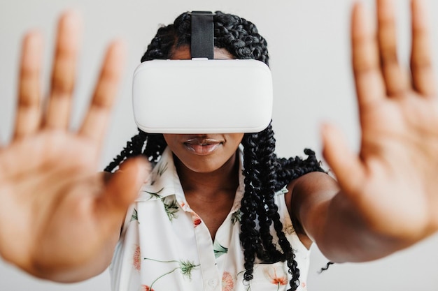 PSD black woman enjoying a  vr headset mockup