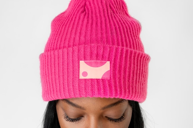 Black woman wearing a hot pink beanie mockup