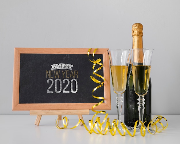 Blackboard mock-up for new year party and champagne