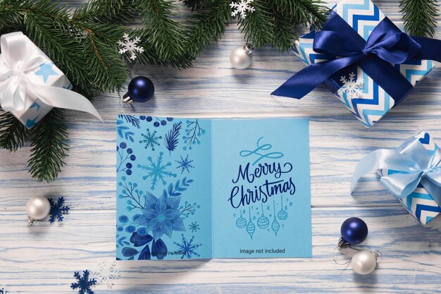 Blank Christmas greeting card with gift boxes 