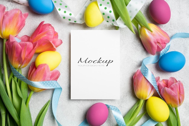 blank easter greeting card mockup with easter eggs and tulips decor white flyer card with copy space