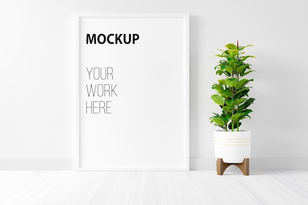 Blank empty picture frame mockup on white cement wall