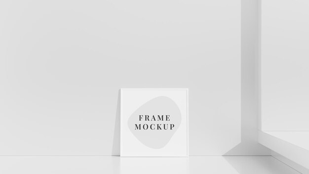 Blank frame on a wall in minimal interior with natural light