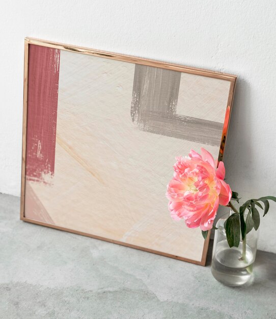 blank golden frame mockup by a coral sunset peony