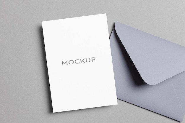 Blank invitation or greeting card mockup with envelope