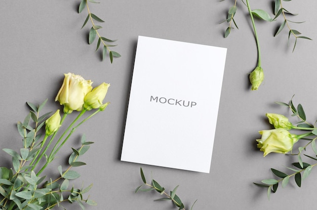 Blank invitation or greeting card mockup with flowers