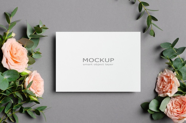 Blank invitation or save the date card mockup with fresh roses flowers