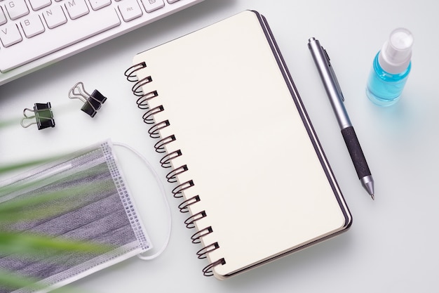 blank notebook for covid 19 work at home concept.
