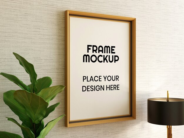 Blank photo frame mockup with plant and lamp