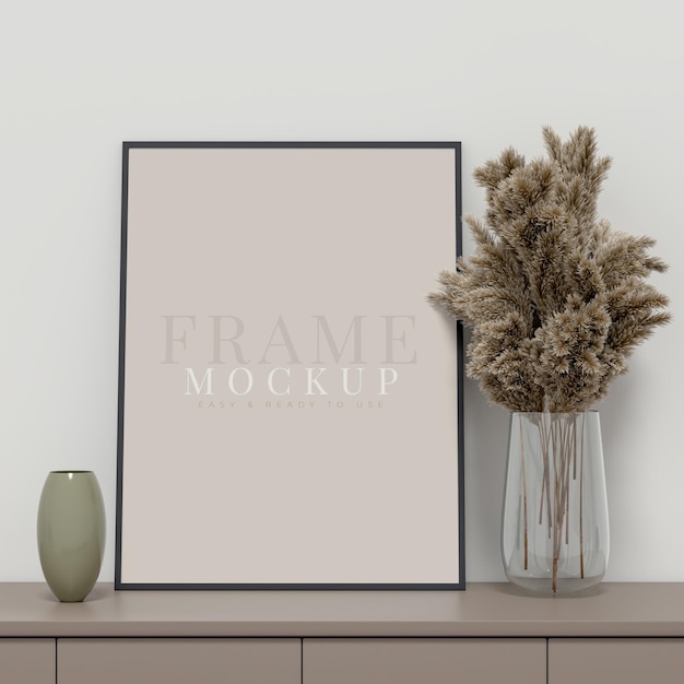 Cornice vuota per fotografie grafiche artistiche con modello di poster mockup leaves frame sulla parete nel rendering 3d di interni domestici