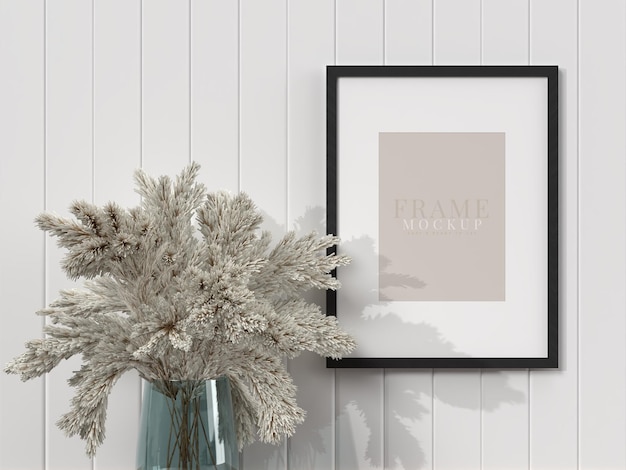 Blank picture frame for photographs art graphics with Leaves Frame poster mockup template on the wall in home interior 3D rendering