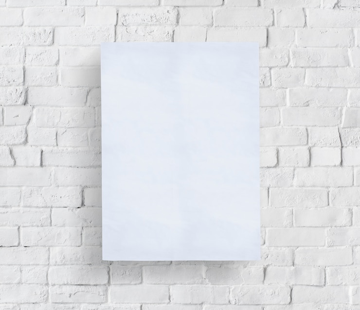 PSD blank poster in front of brick wall