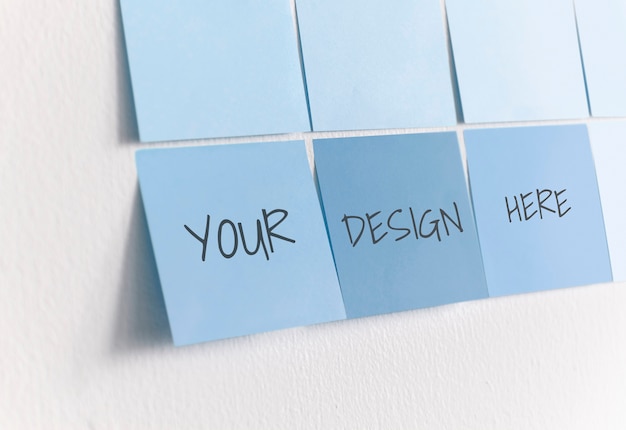 Blank sticky notes on a wall