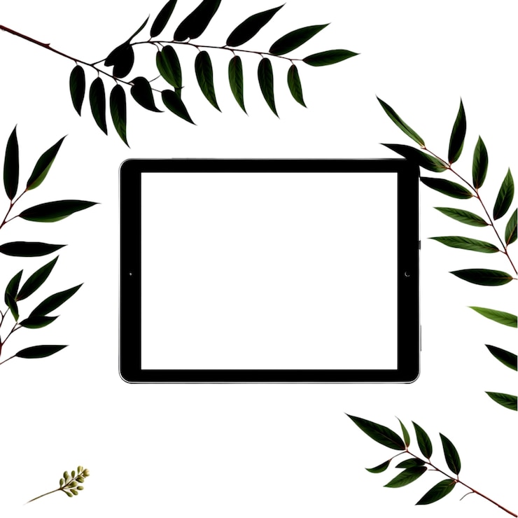 PSD blank tablet screen surrounded by lush green leaves