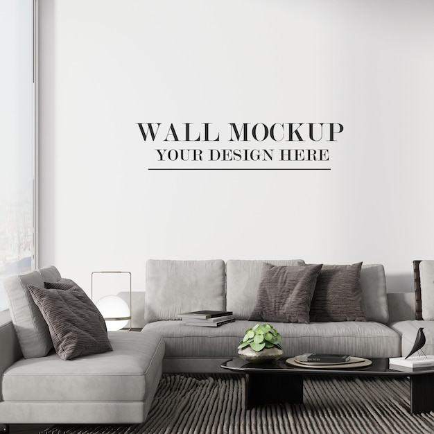 Blank wall mockup behind modern sofa