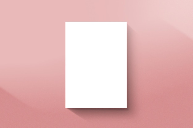 a blank white piece of paper on a pink background