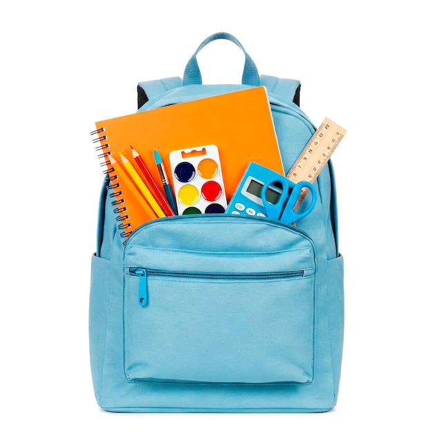 blauwe rugzak vol met verschillende schoolbenodigdheden klaar voor de terugkeer naar het schoolseizoen